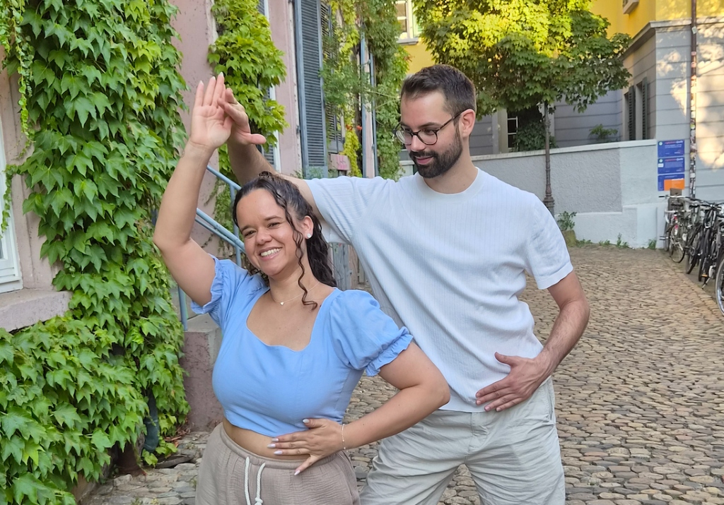 Quality dance instruction showing technique guidance.